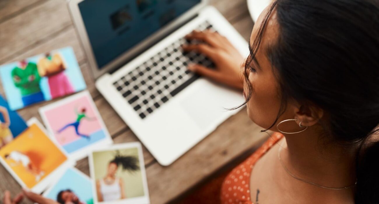 A woman focused on her laptop