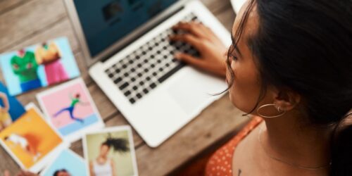 A woman focused on her laptop